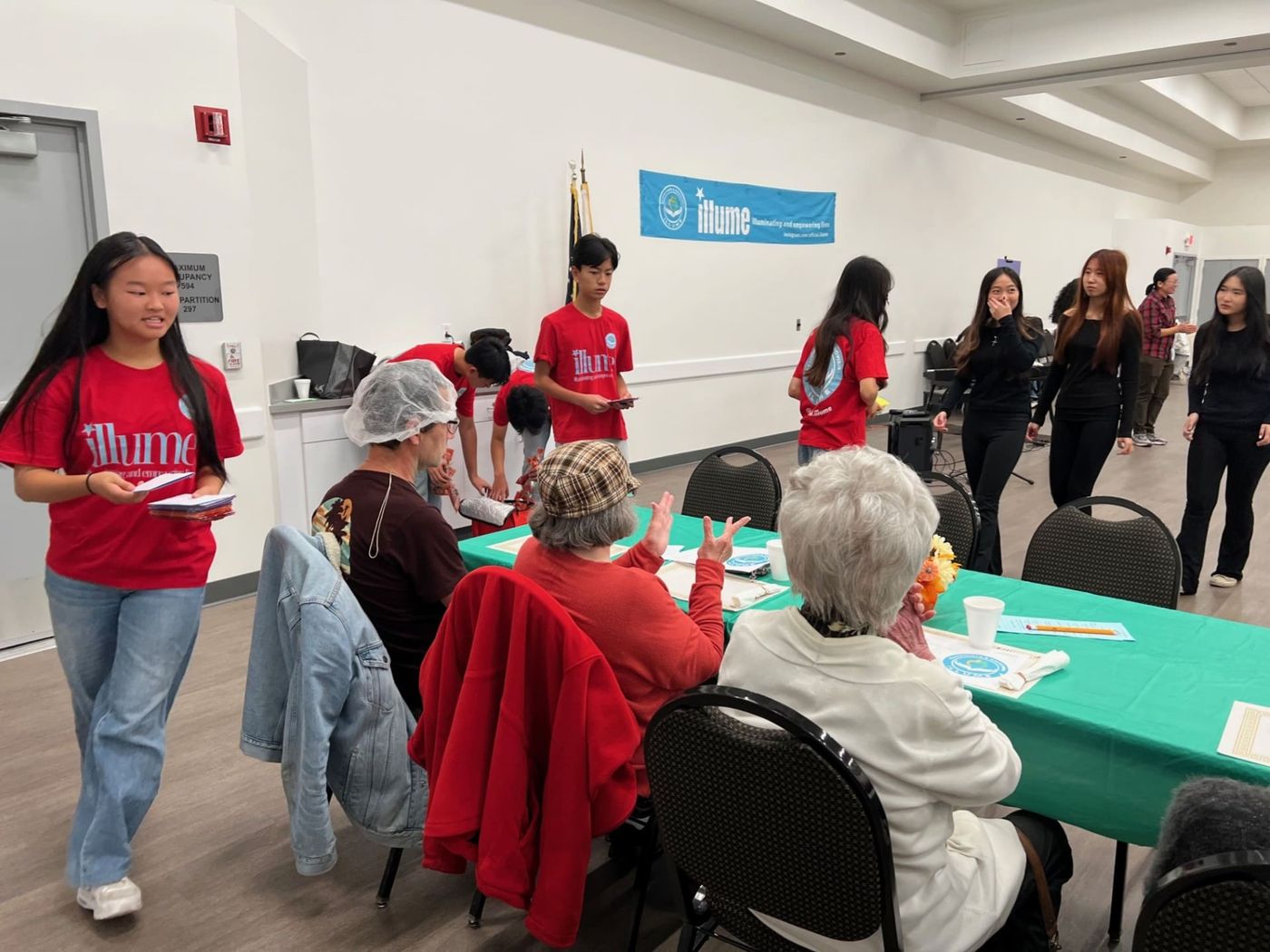 ILLUME passes out handmade holiday cards for seniors 11/25/24