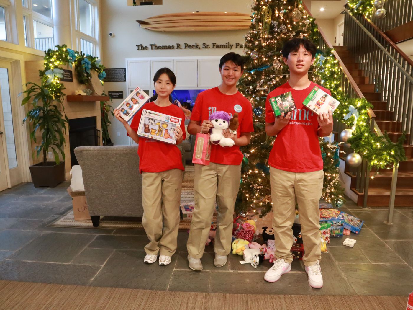 Board members pose with donated toys 12/10/24